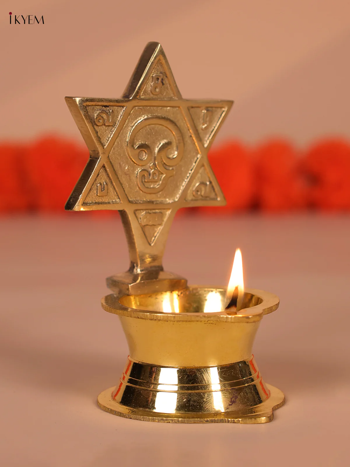 Brass Star Diya with Om Engraving